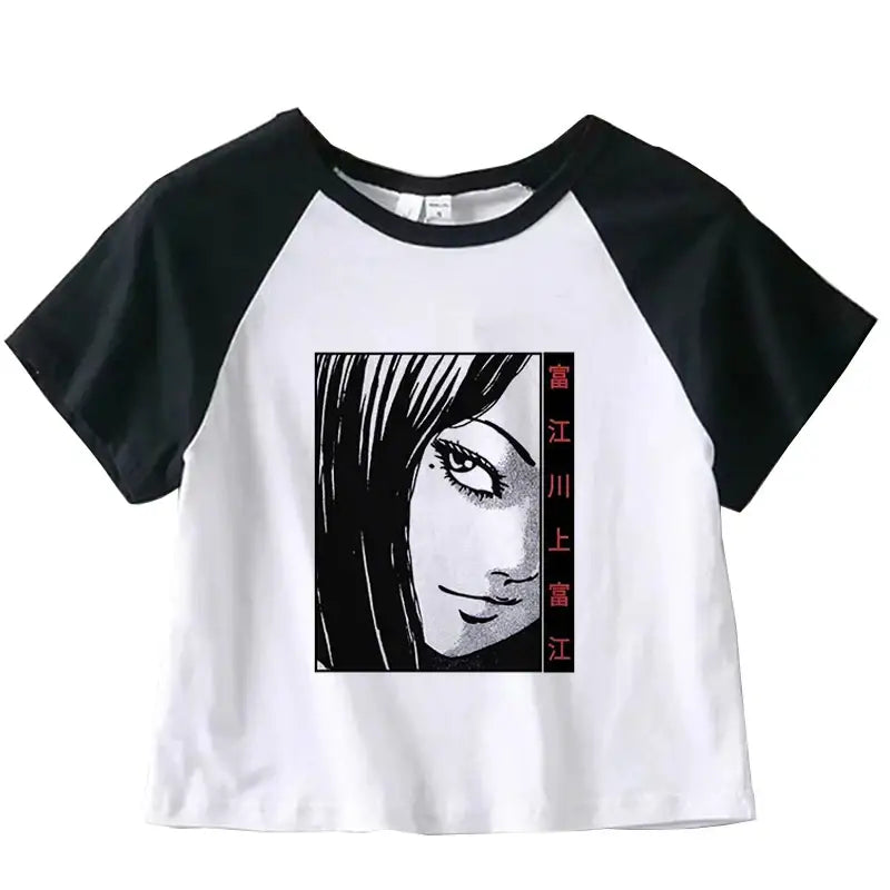 Black and white raglan crop top featuring manga-style artwork on the front.