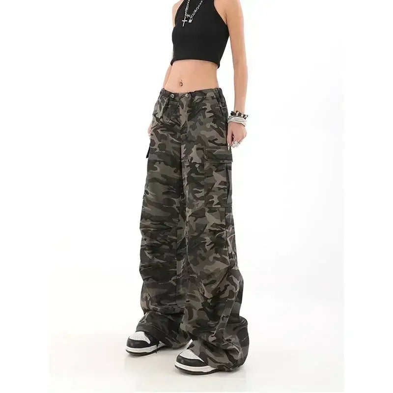 Wide-leg camouflage cargo pants paired with a black crop top.