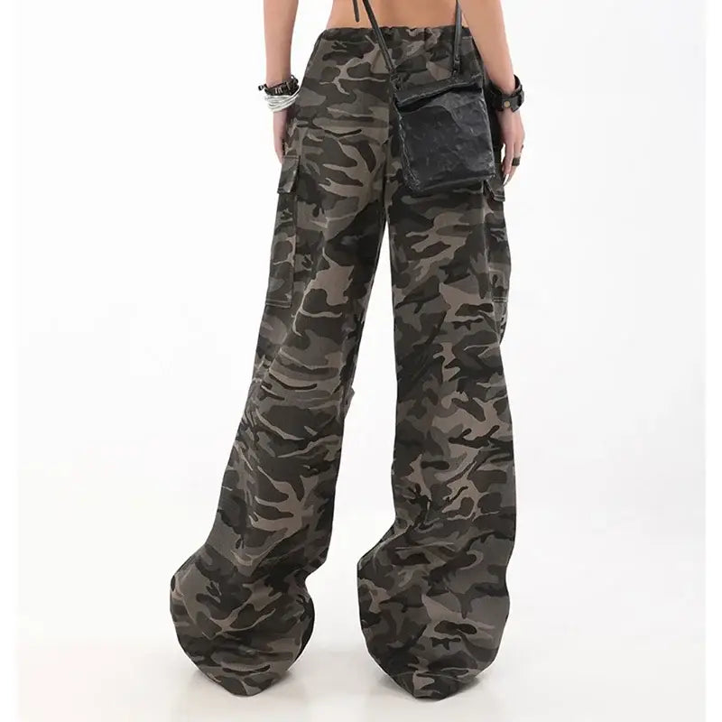 Wide-leg camouflage cargo pants in gray and black tones.