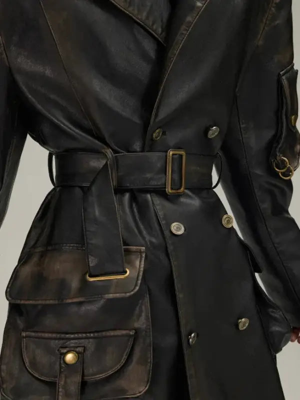 Black leather trench coat with a belt and cargo pockets.