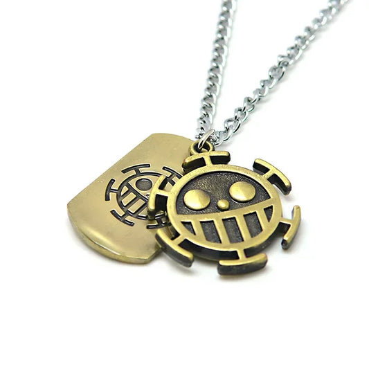 Gold-toned One Piece necklace for anime fans, ideal for graphic tee styling