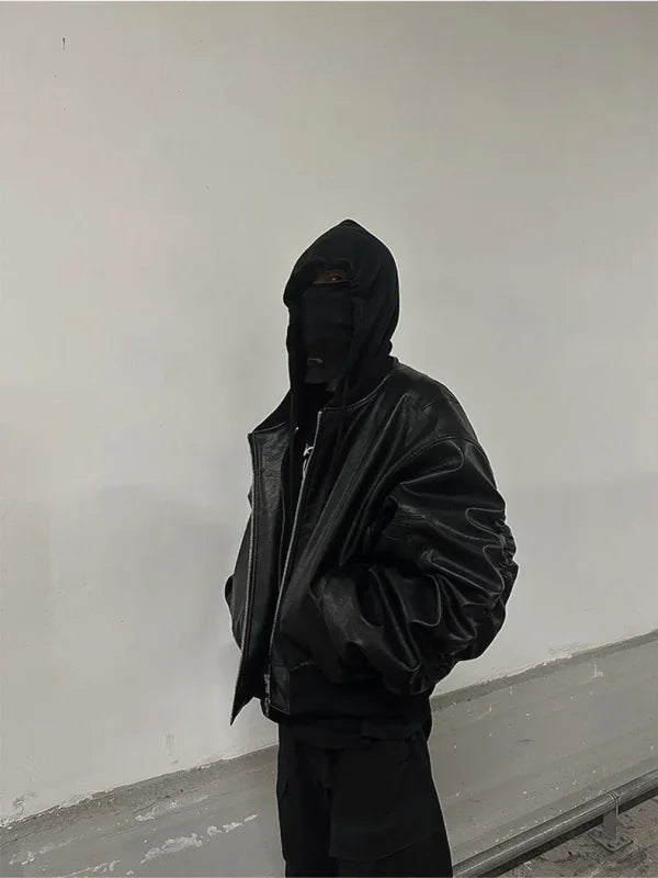 Person in black balaclava wearing Mauroicardi oversized black thickened leather bomber jacket