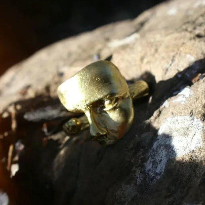 Golden face ring showcasing the Mystical Masked Faces Adjustable Open-Band with metal finish