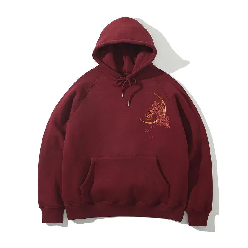 Maroon dragon embroidered hoodie featuring a gold crescent moon design for mythical style