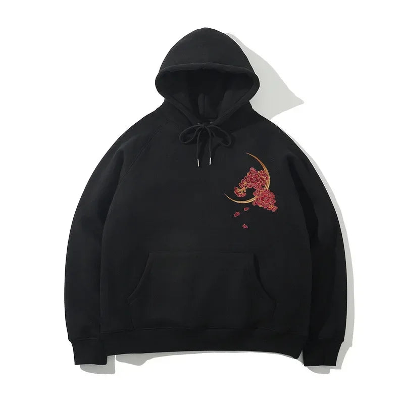 Black hooded sweatshirt with floral moon and mythical dragon embroidered design