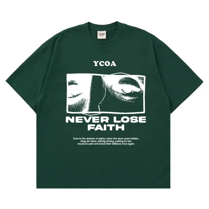 Dark green t-shirt with white text and a close-up eye graphic design.