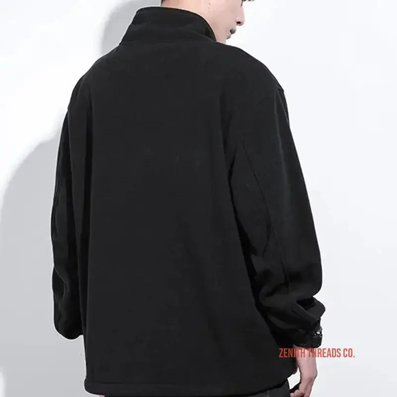 Black fleece pullover jacket with a high collar.