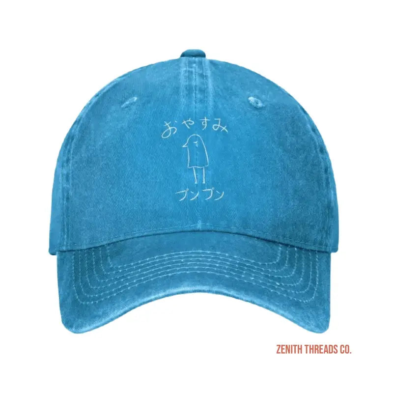 Light blue baseball cap with Japanese text and a simple line drawing.