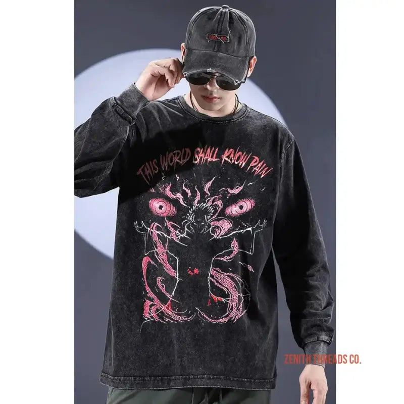 Black long-sleeve t-shirt featuring pink demonic artwork and text design.