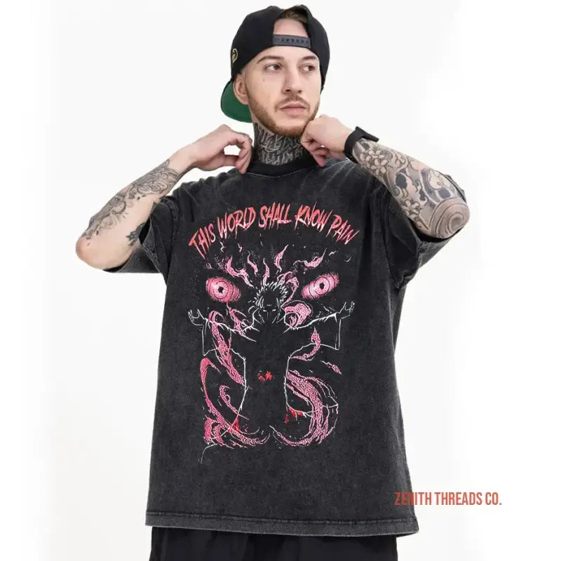 Black t-shirt featuring pink demonic artwork and text reading ’THIS WORLD SHALL BURN DOWN’