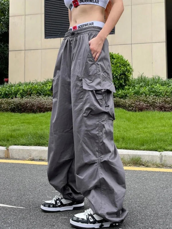 Gray cargo pants showcasing durable polyester in Parachute Black Cargo Y2K streetwear style