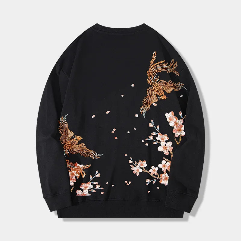 Black sweatshirt featuring phoenix embroidery and cherry blossoms in vintage Japanese streetwear