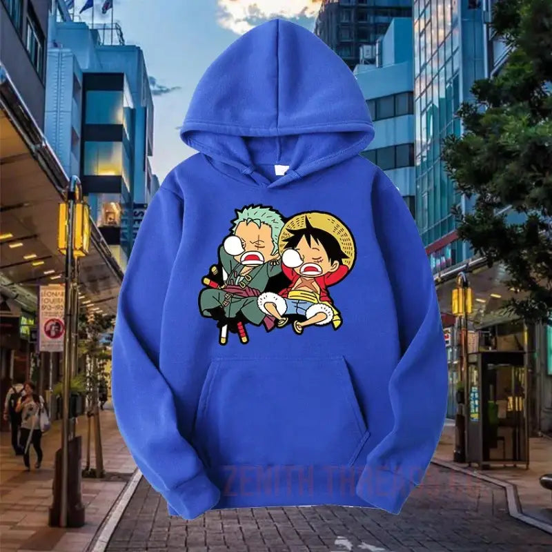 Royal blue hoodie featuring a cartoon design of One Piece characters Luffy and Zoro.