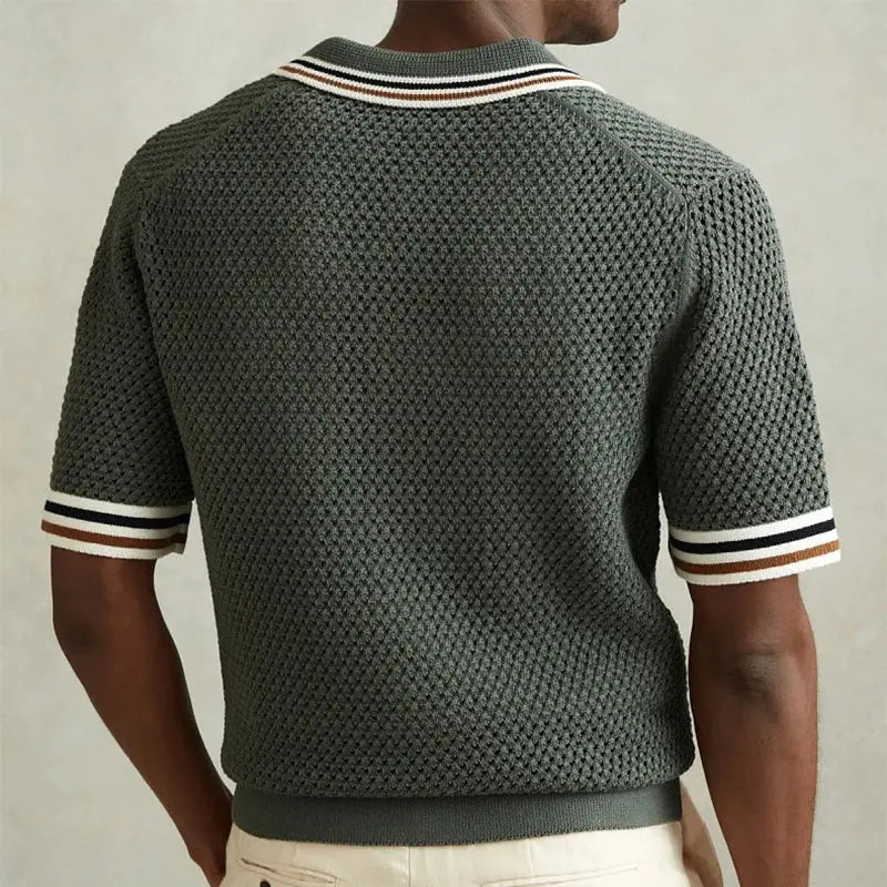 Dark green knitted polo shirt with white striped trim on the sleeves and collar.