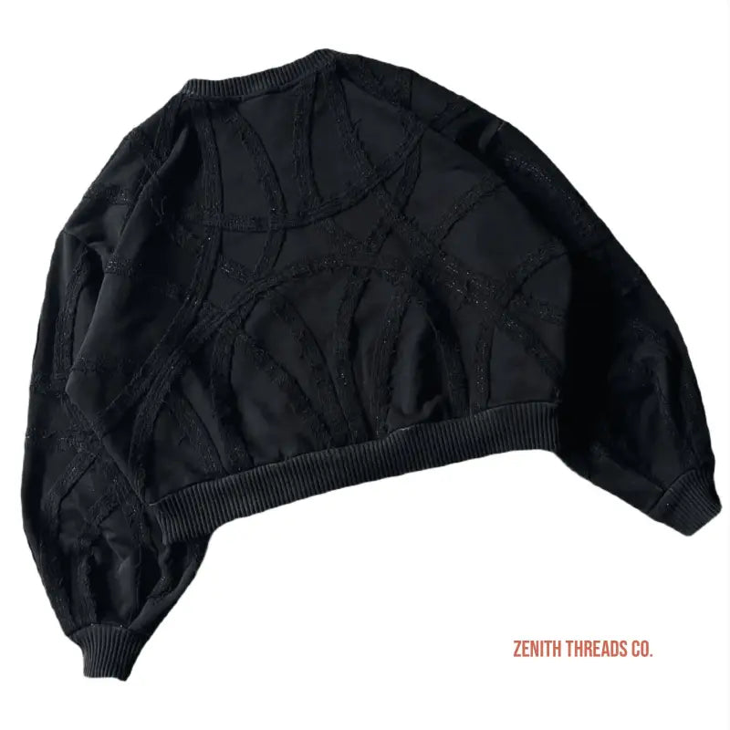 Black quilted liner cap with ribbed trim.