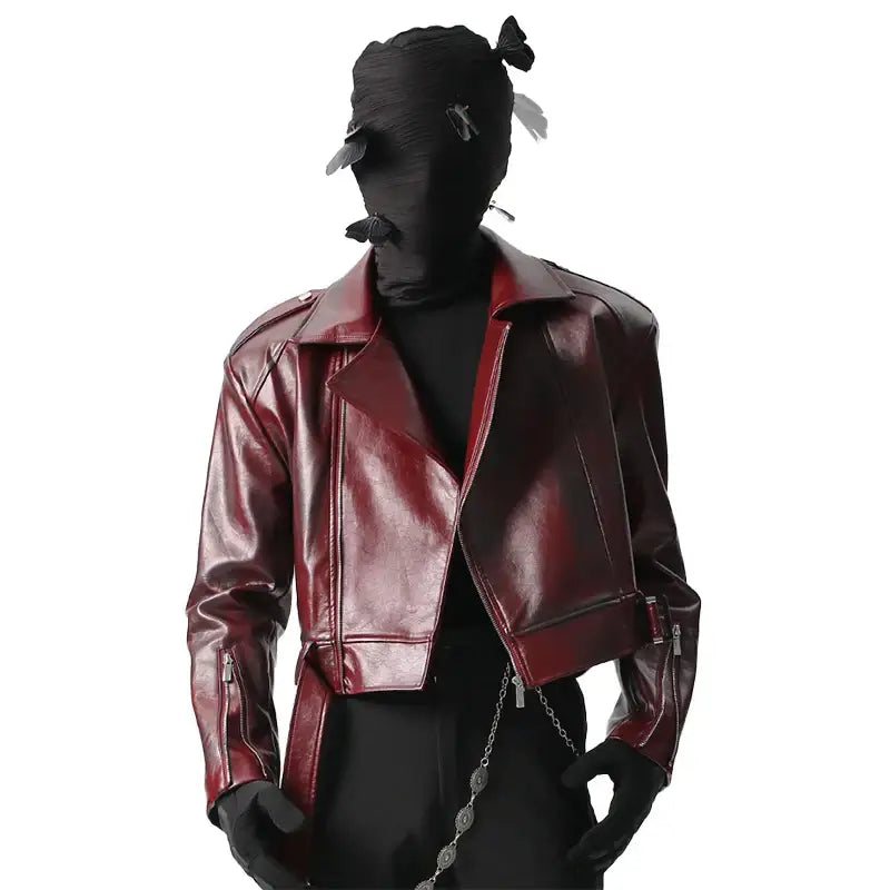 Burgundy leather motorcycle jacket with asymmetrical zipper detailing.