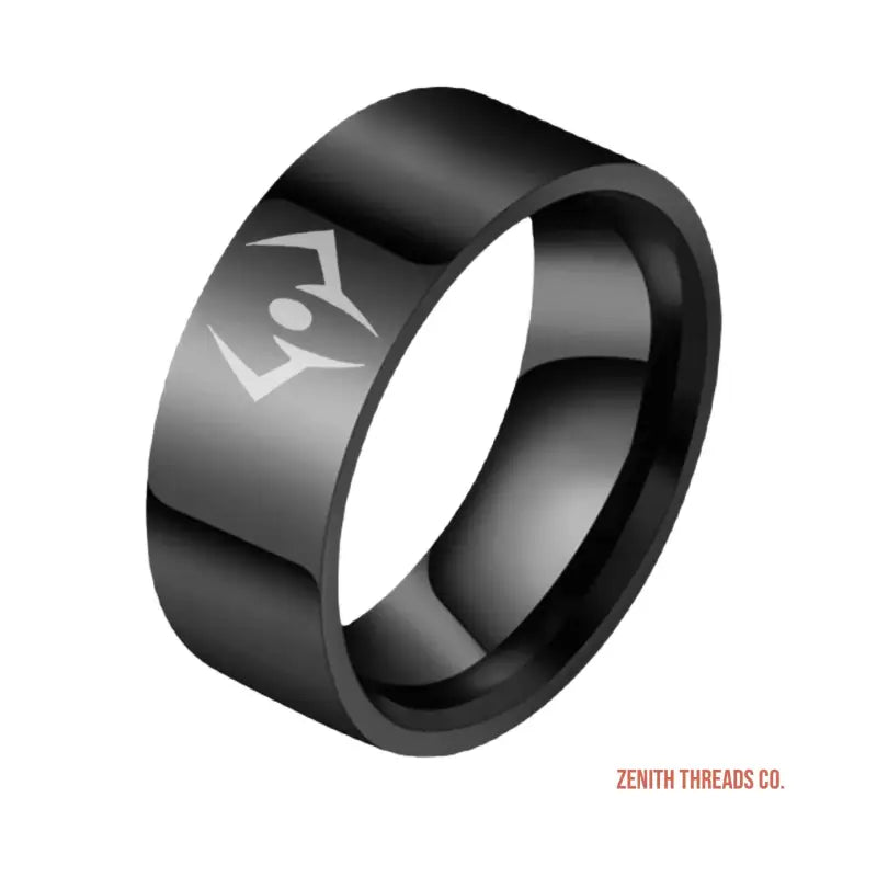 Black metal ring with an engraved geometric symbol.