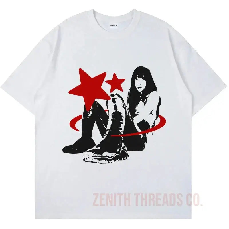 White t-shirt featuring a black and red graphic design with stars, boots, and a figure.