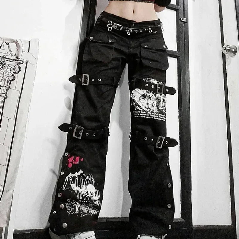 Black cargo pants featuring buckles and graphic prints, perfect for techwear gothic low style