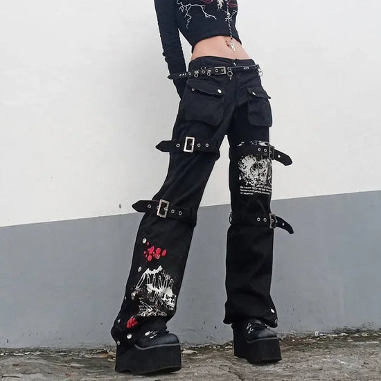 Black cargo pants with straps, featuring a gothic low waist design in techwear style