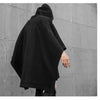 Black hooded poncho from Telisan Techwear, featuring a three-dimensional pocket design