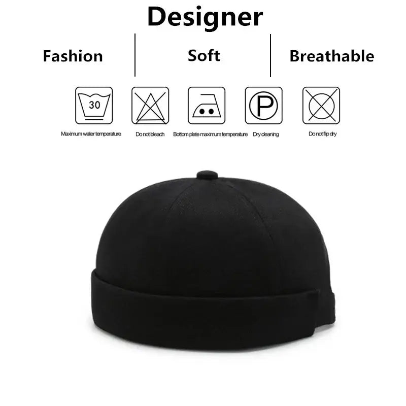 Black brimless beanie cap with a rolled cuff.