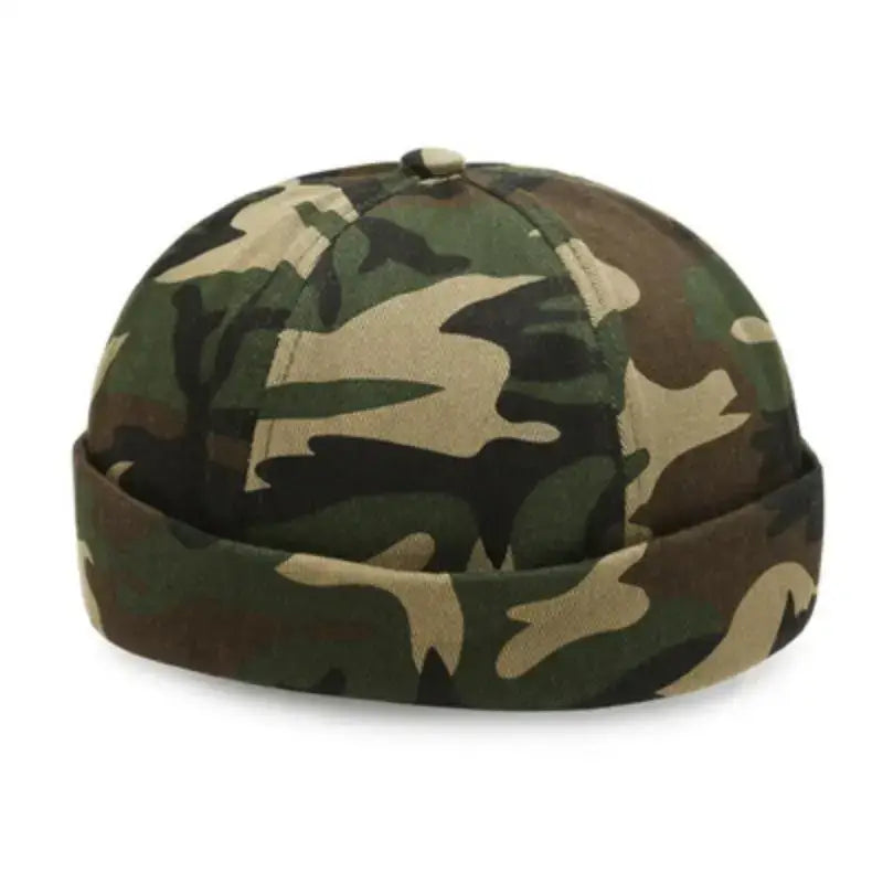 Camouflage-patterned beanie cap with a rolled brim.