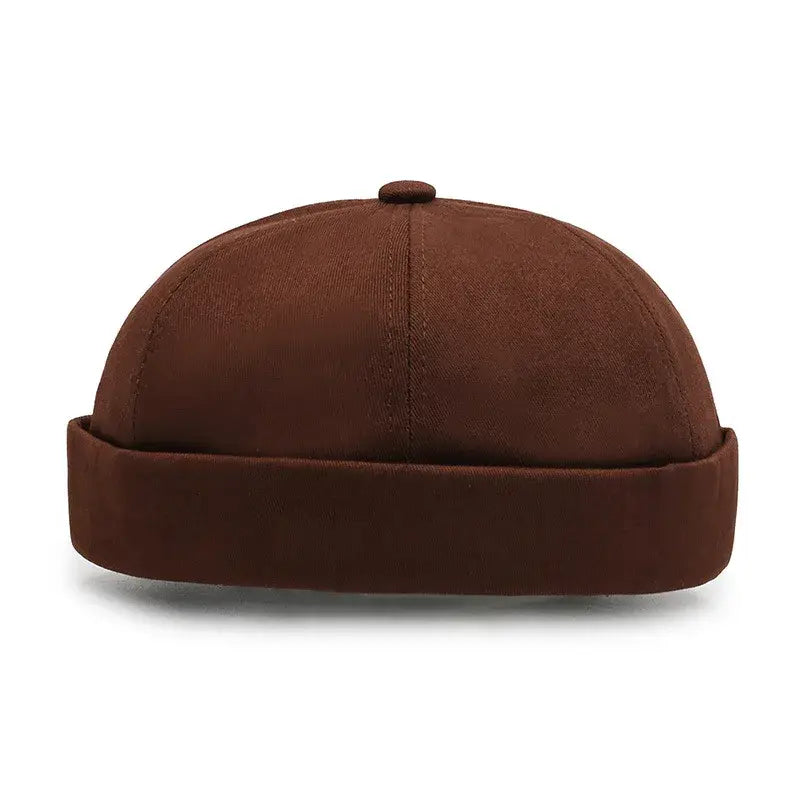 Brown docker cap with a rolled brim.