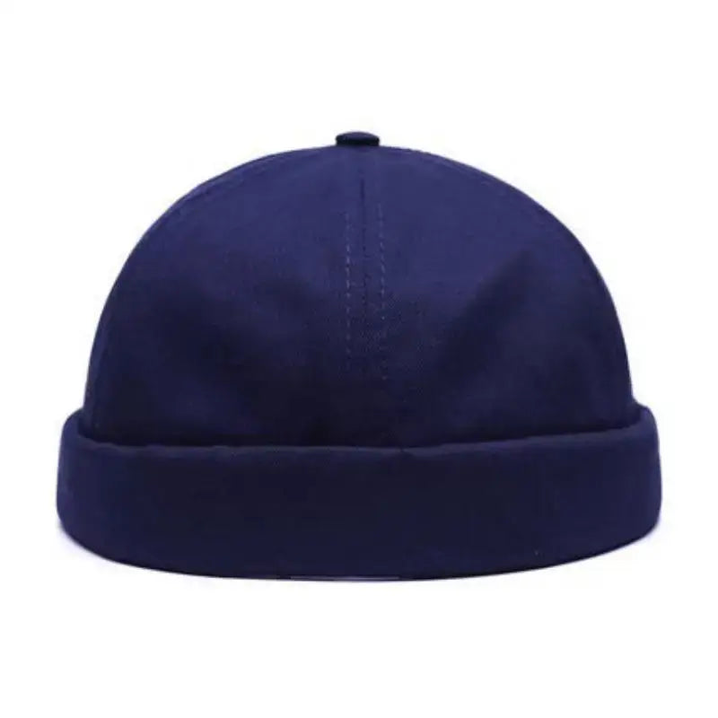 Navy blue docker cap with a rolled brim.