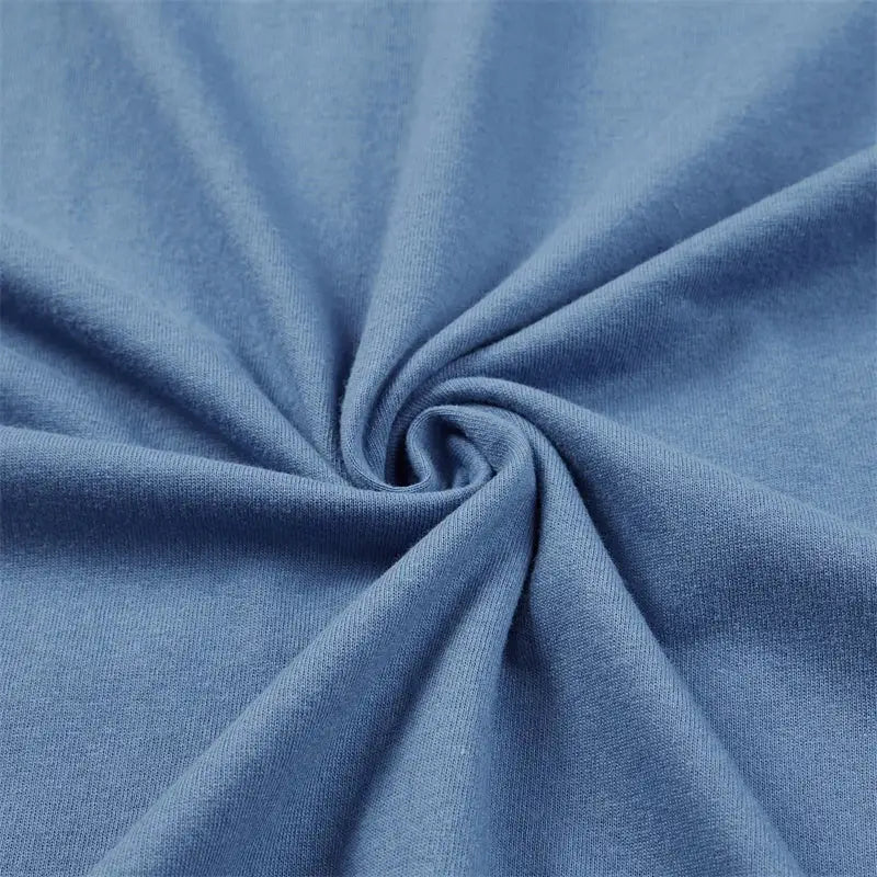 Twisted blue fabric creating a spiral pattern.