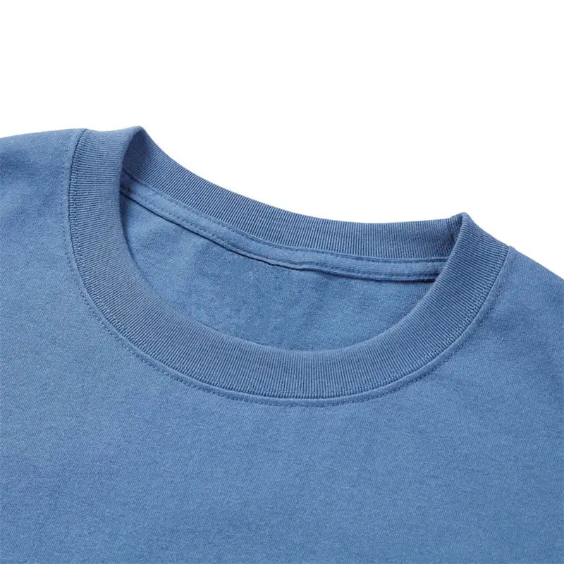 Light blue t-shirt collar with ribbed neckline.