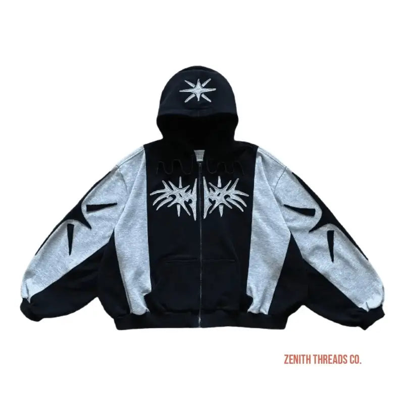 Black and gray zip-up hoodie with tribal-style designs.