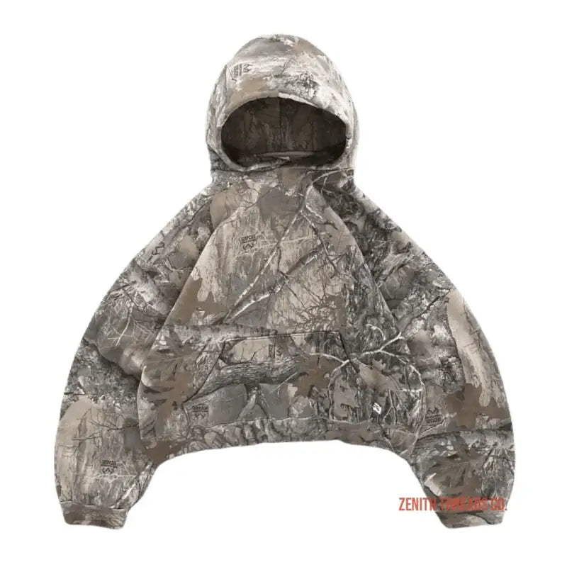 Camouflage hooded winter jacket with a marble-like gray pattern.