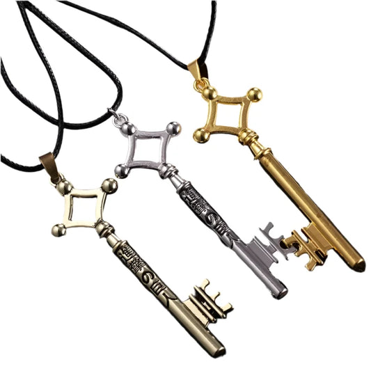 Three zinc alloy key pendants on black cords in Eren’s Key necklace design