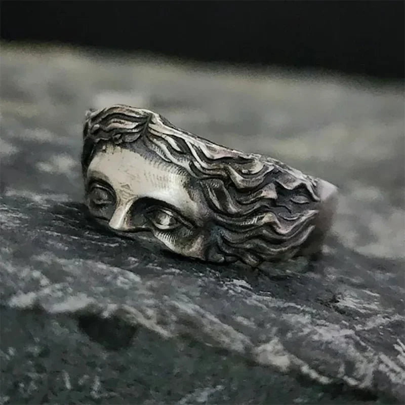 Silver Venus Mask adjustable ring featuring intricate relief detailing in a unique design