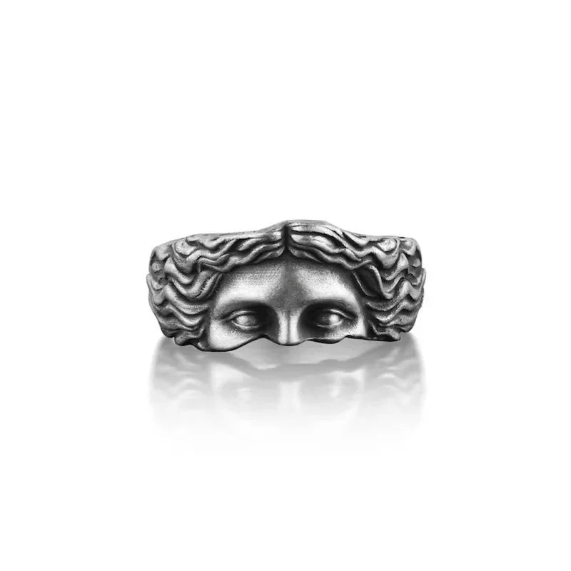 Silver Venus mask adjustable ring featuring intricate relief detailing of a woman’s face