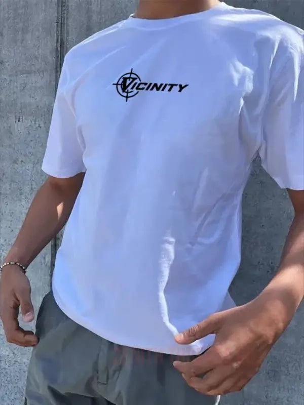 White t-shirt with ’Infinity’ logo and compass design.