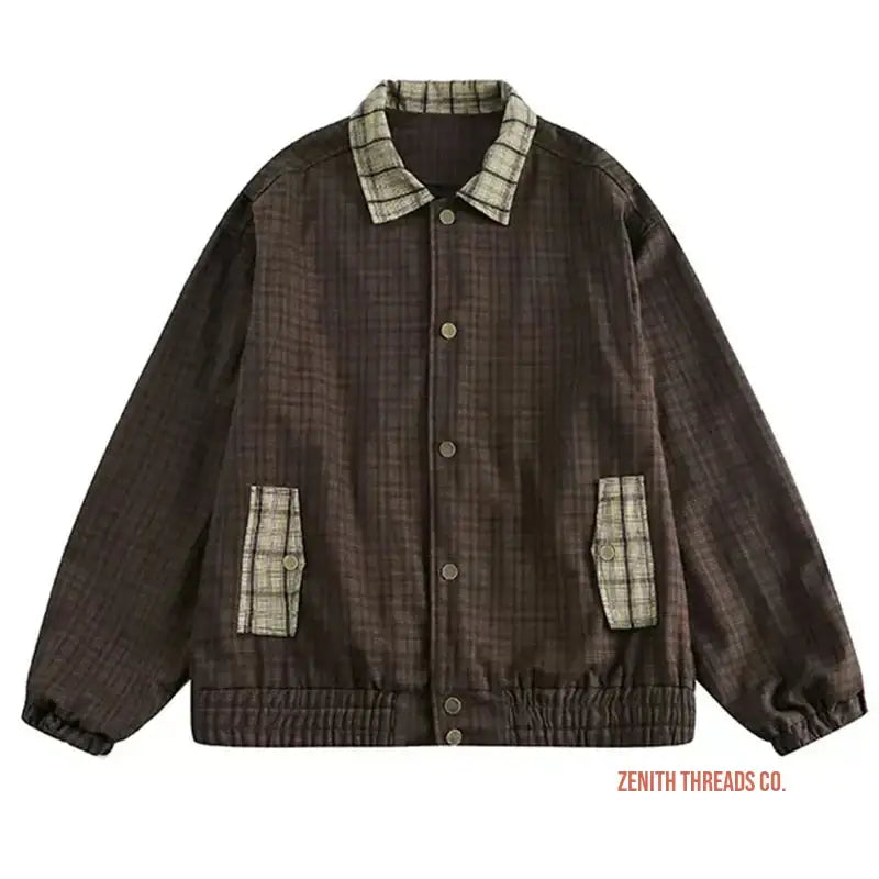 Brown corduroy jacket with plaid collar and pocket accents.