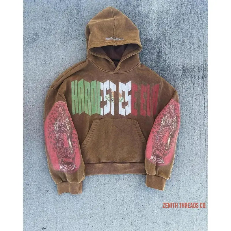 Brown hooded sweatshirt with ’Hardest’ text in Italian flag colors and decorative red sleeve designs.