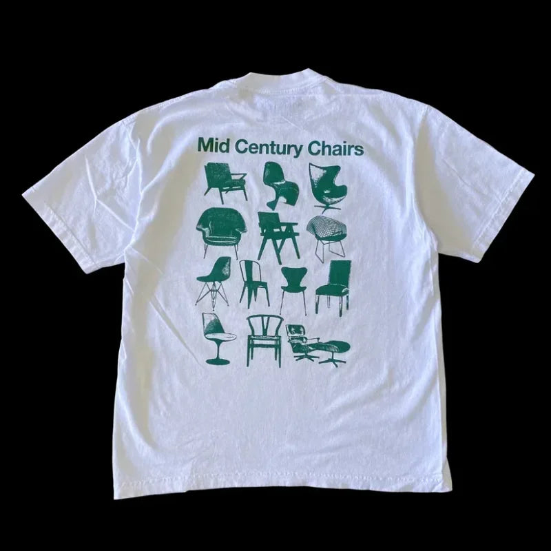 White t-shirt featuring green illustrations of various mid-century modern chair designs.