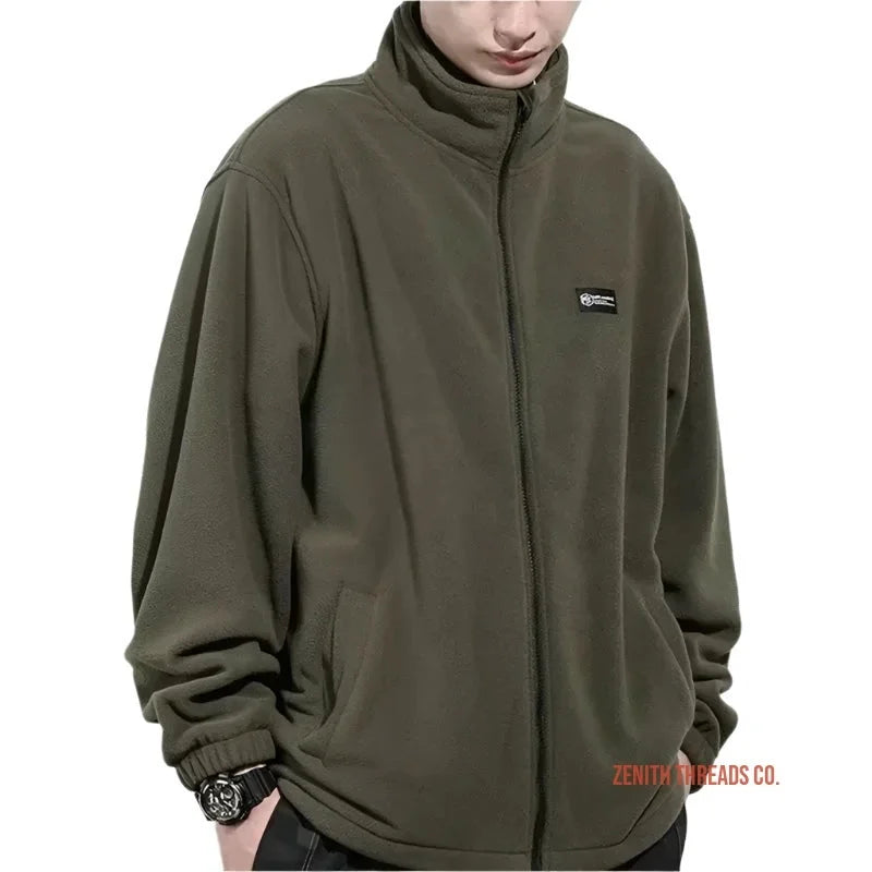 Olive green fleece jacket with a high collar and small brand patch.