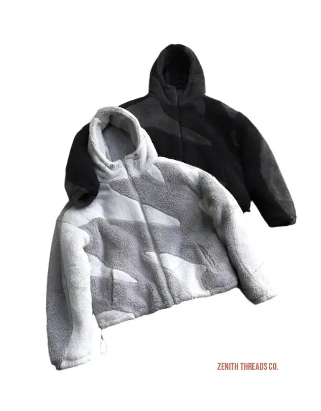 Two hooded sweatshirts in black and white colors.