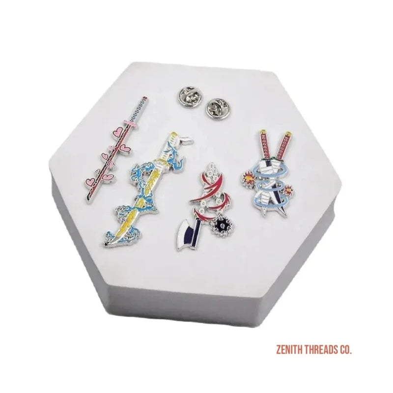 Collection of decorative enamel pins displayed on a hexagonal surface.