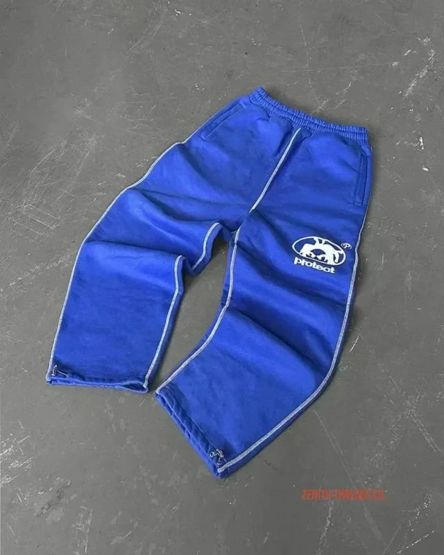 Royal blue sweatpants with a panda logo on the leg.