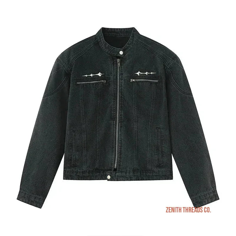 Black denim jacket with decorative stitching and a front zipper closure.