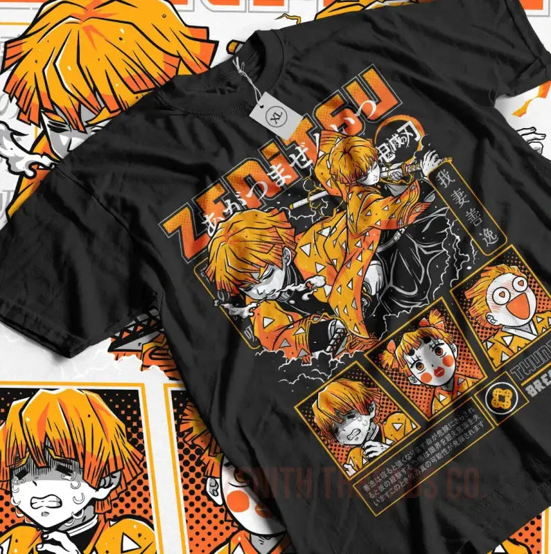 Black t-shirt featuring anime/manga-style artwork with orange and yellow character illustrations in a comic panel layout.